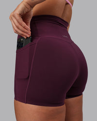Woman wearing Elixir Ultra High-Rise 4" Short Pockets - Cherry Lacquer | Model:Lyss | Size:S | Thumbnail Index: 4