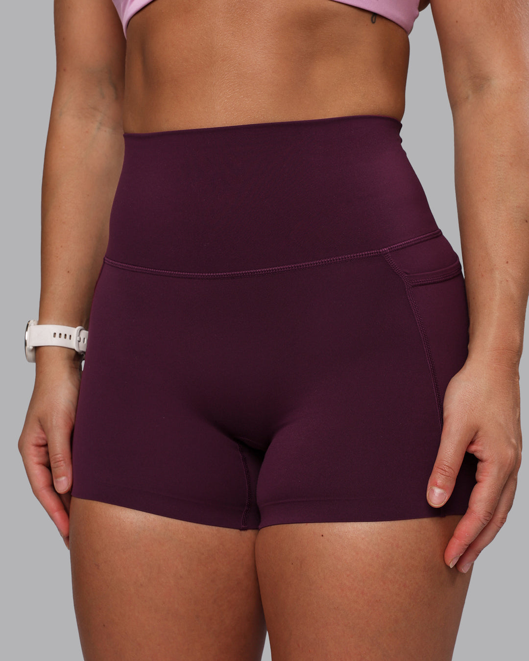 Woman wearing Elixir Ultra High-Rise 4" Short Pockets - Cherry Lacquer | Model:Lyss | Size:S - view 2