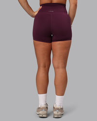 Woman wearing Elixir Ultra High-Rise 4" Short Pockets - Cherry Lacquer | Model:Lyss | Size:S | Thumbnail Index: 3