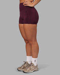 Woman wearing Elixir Ultra High-Rise 4" Short Pockets - Cherry Lacquer | Model:Lyss | Size:S | Thumbnail Index: 9