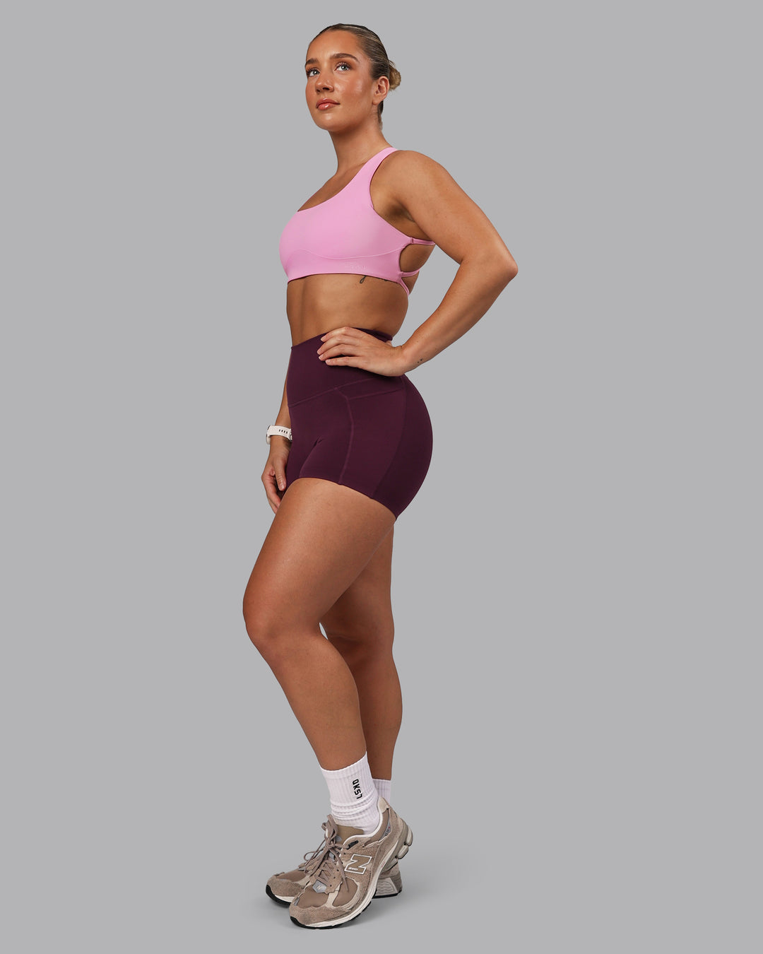 Woman wearing Elixir Ultra High-Rise 4" Short Pockets - Cherry Lacquer | Model:Lyss | Size:S - view 6