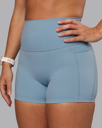 Woman wearing Elixir Ultra High-Rise 4" Short Pockets - Glacier Lake | Model:Lyss | Size:S | Thumbnail Index: 7