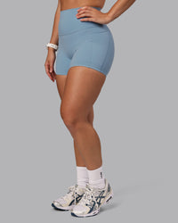 Woman wearing Elixir Ultra High-Rise 4" Short Pockets - Glacier Lake | Model:Lyss | Size:S | Thumbnail Index: 9