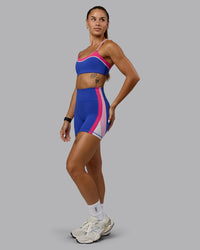 Woman wearing Embrace Sports Bra - Power Cobalt-Fuchsia Pink | Thumbnail Index: 2
