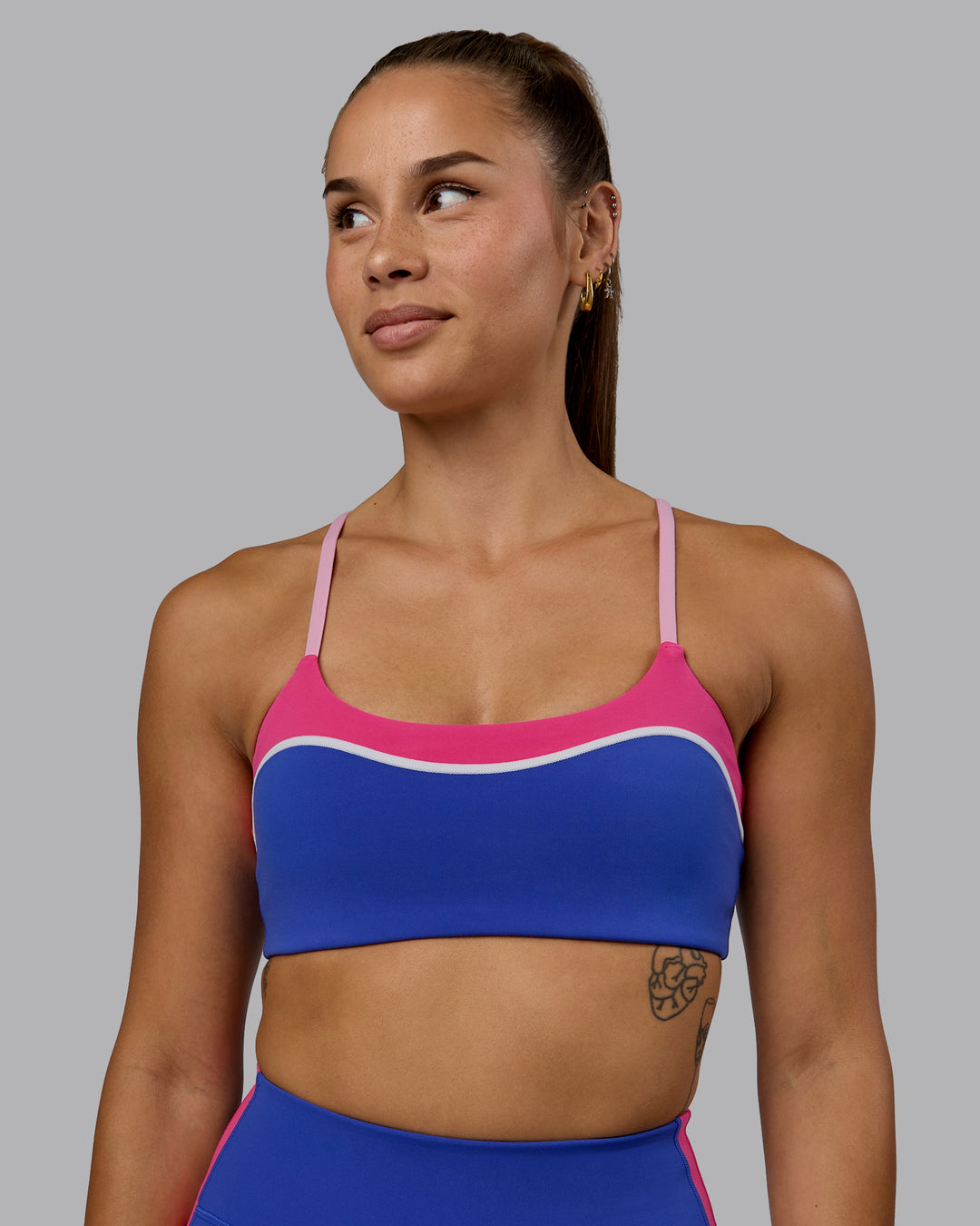 Woman wearing Embrace Sports Bra - Power Cobalt-Fuchsia Pink - view 5