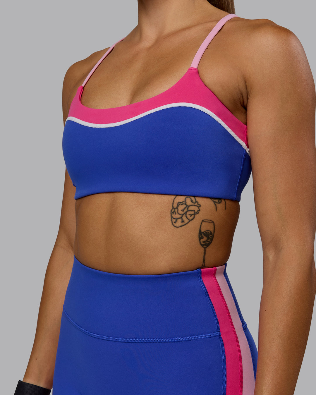 Woman wearing Embrace Sports Bra - Power Cobalt-Fuchsia Pink - view 7