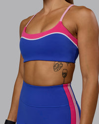 Woman wearing Embrace Sports Bra - Power Cobalt-Fuchsia Pink | Thumbnail Index: 6