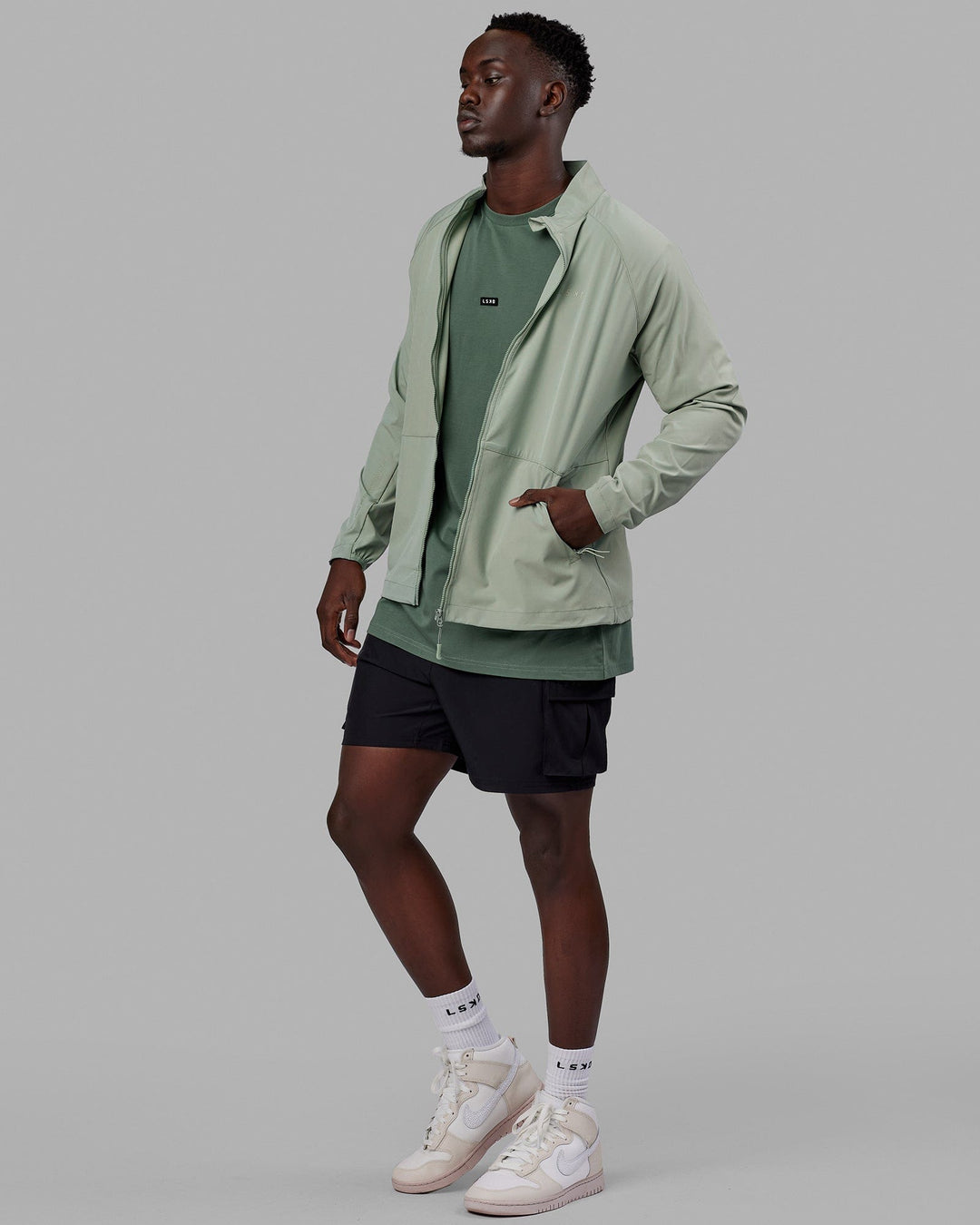Man wearing Energy Stretch Performance Jacket - Iceberg Green - view 3