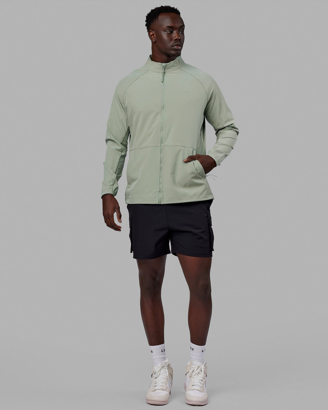 Man wearing Energy Stretch Performance Jacket - Iceberg Green - view 6