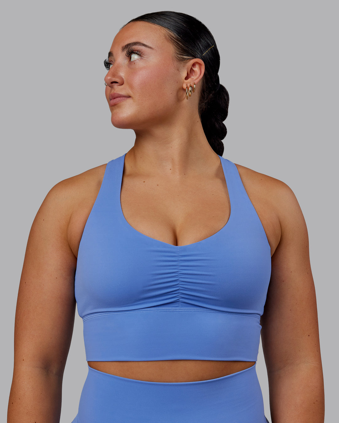 Woman wearing Evoke Sports Bra - Ultramarine - view 6