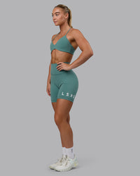 Woman wearing Evolved Ultra High-Rise 6" Short - Sagebrush-White | Thumbnail Index: 0