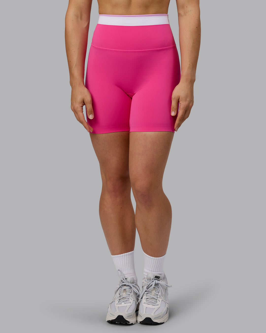 Woman wearing Excel Ultra High-Rise 6" Short - Ultra Pink - view 8