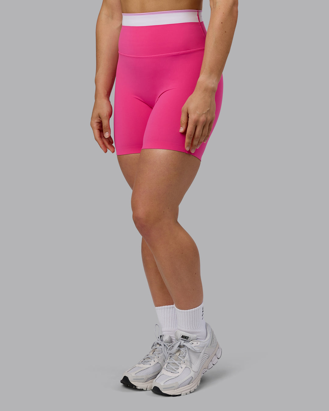 Woman wearing Excel Ultra High-Rise 6" Short - Ultra Pink - view 3