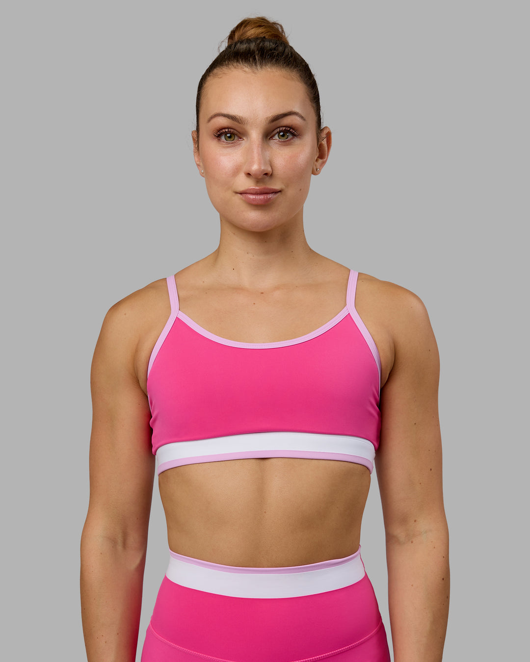 Woman wearing Excel Sports Bra - Ultra Pink - view 3