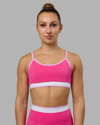 Woman wearing Excel Sports Bra - Ultra Pink | Thumbnail Index: 2