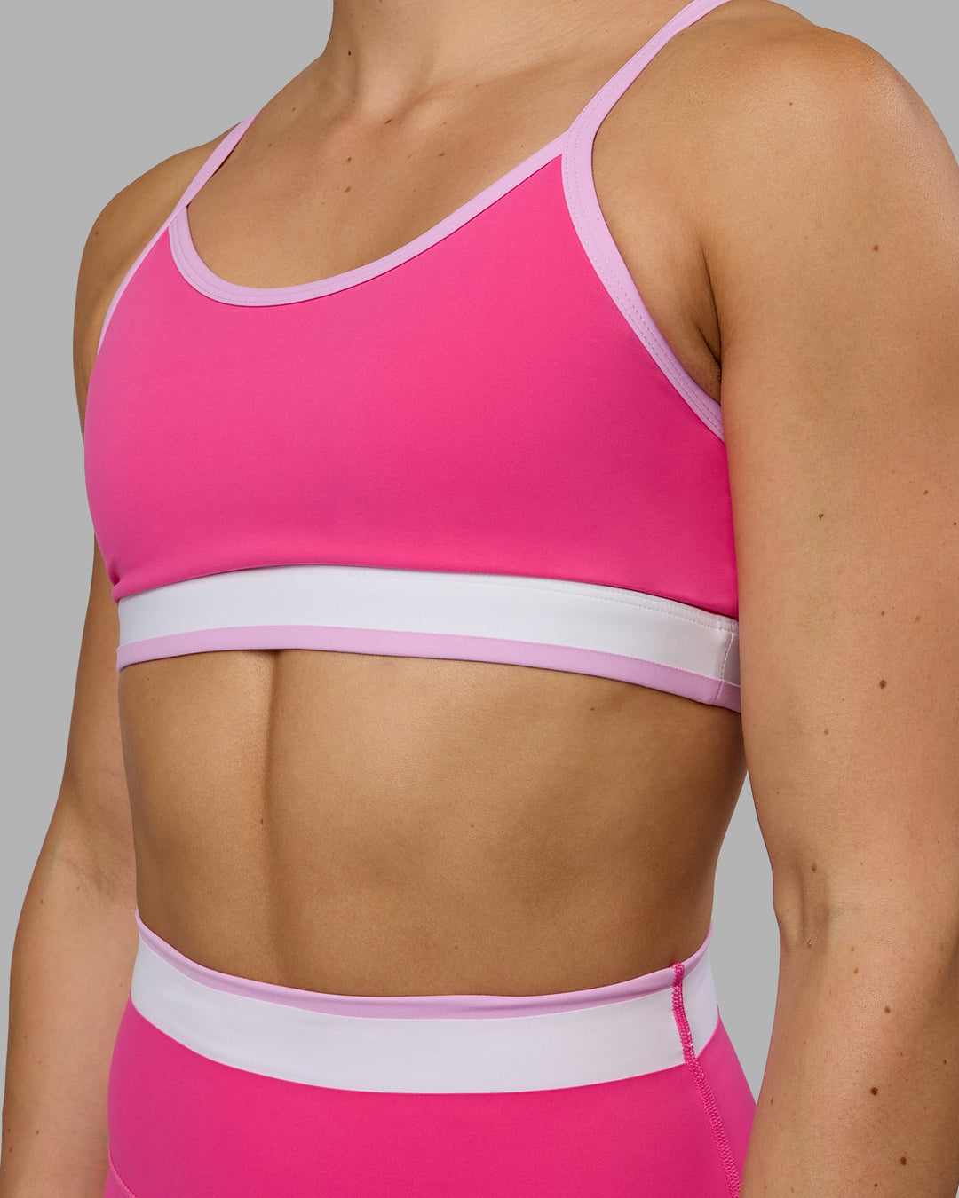 Woman wearing Excel Sports Bra - Ultra Pink - view 5