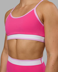 Woman wearing Excel Sports Bra - Ultra Pink | Thumbnail Index: 4