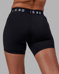 Woman wearing Extend Mid-Rise 6" Short - Black-White | Thumbnail Index: 10