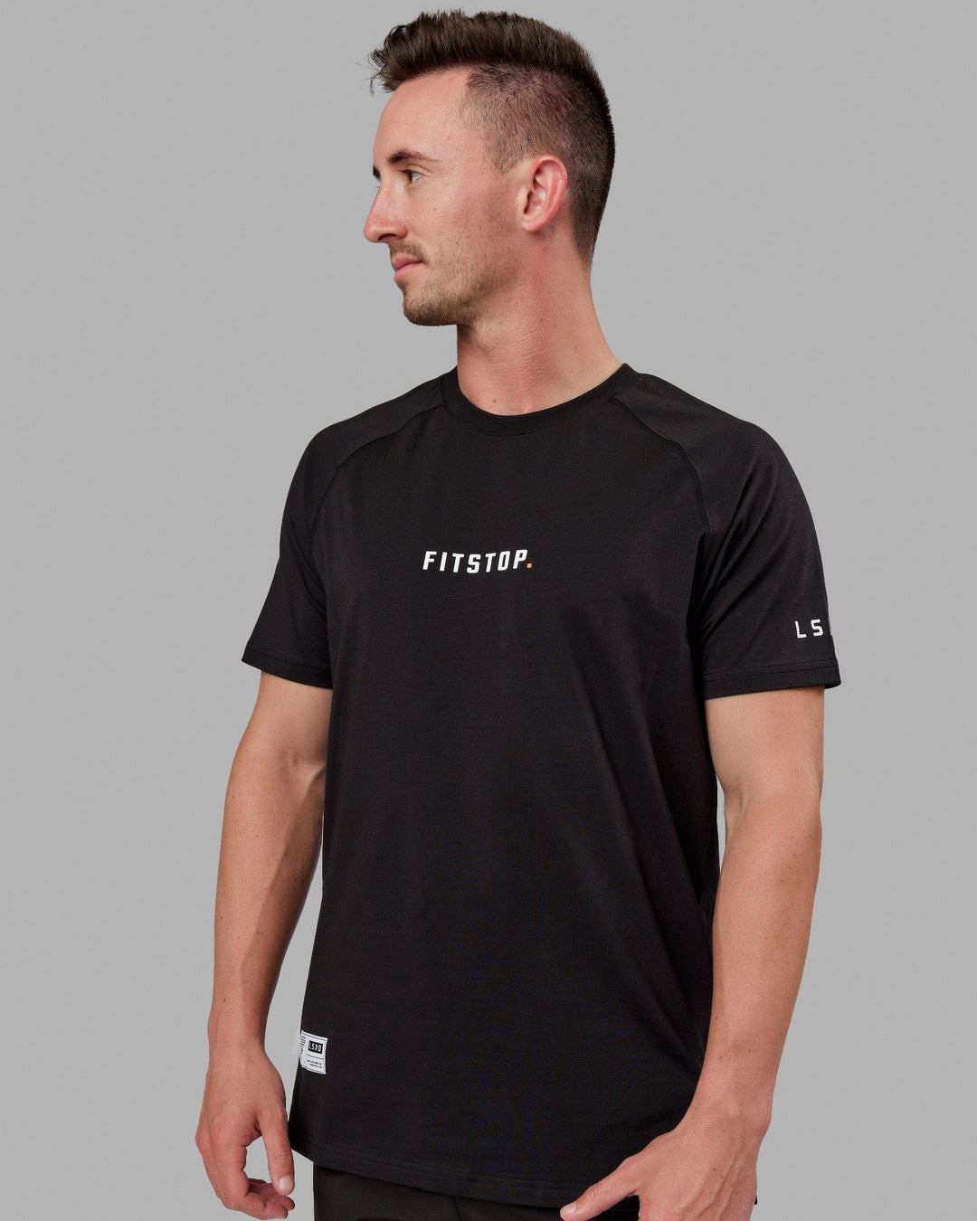 Man wearing Fitstop Optimal Tee - Black - view 1