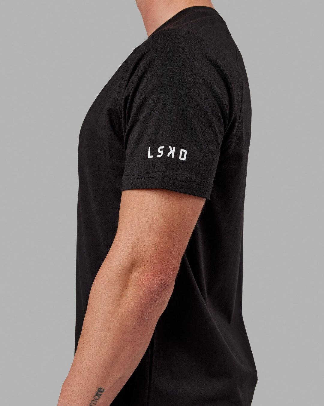 Man wearing Fitstop Optimal Tee - Black - view 5