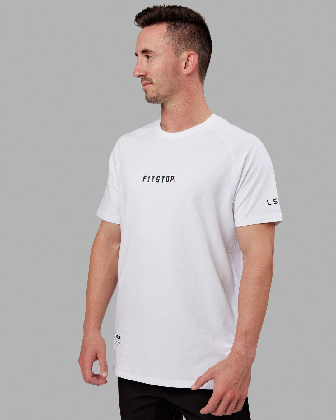 Man wearing Fitstop Optimal Tee - White - view 1