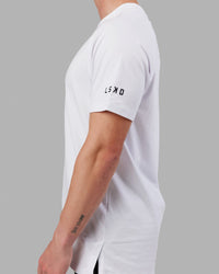 Man wearing Fitstop Optimal Tee - White | Thumbnail Index: 4