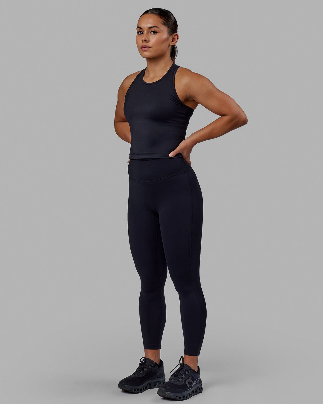 Woman wearing Flow Performance Tank - Black - view 6