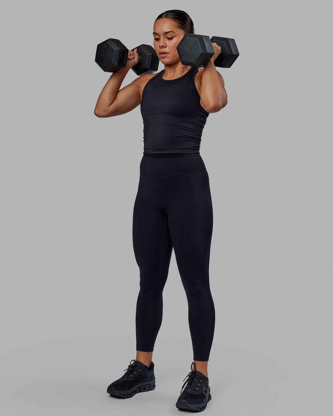 Woman wearing Flow Performance Tank - Black - view 5
