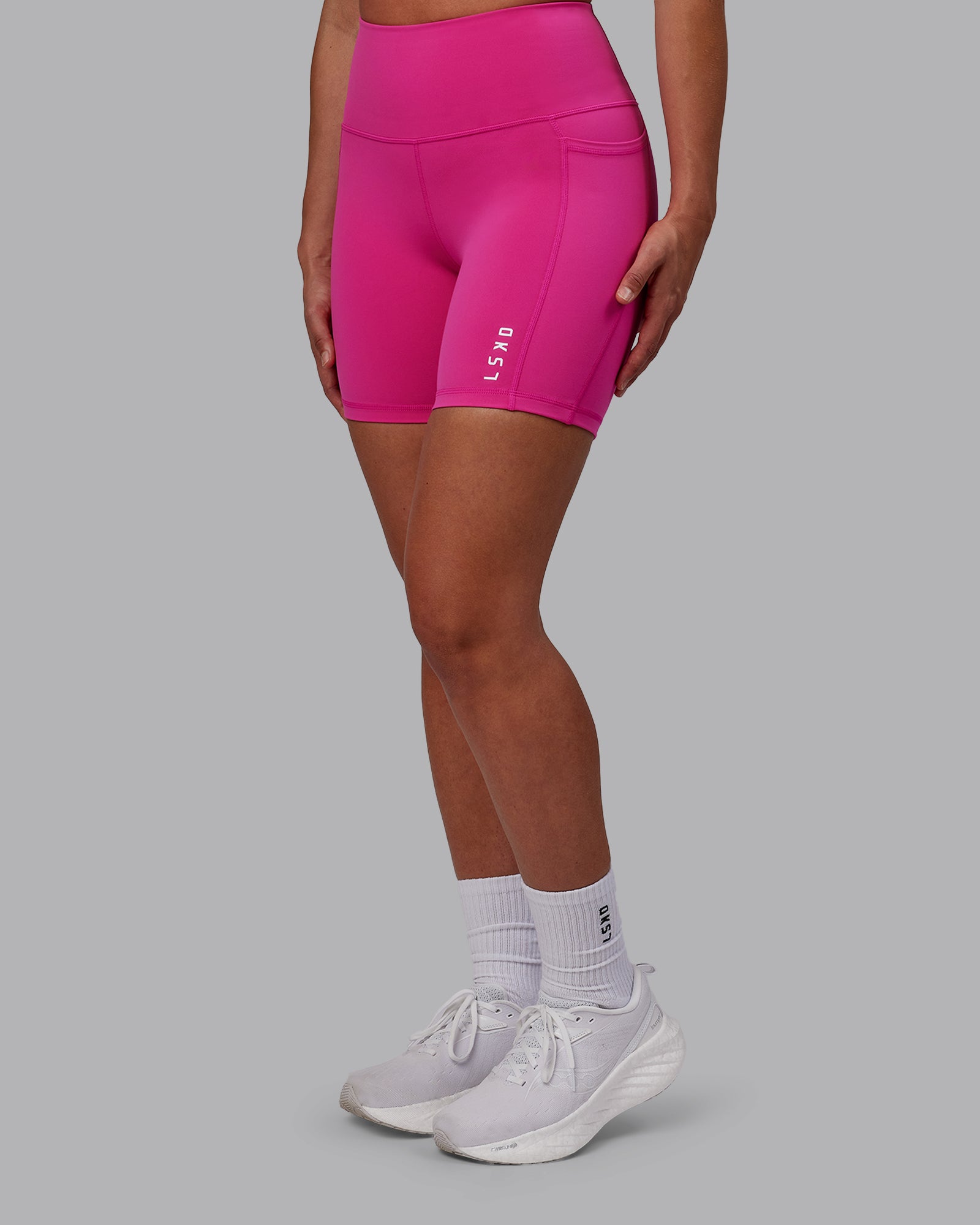 Woman wearing Flux Ultra High-Rise 6" Short Pockets - Fuchsia Pink