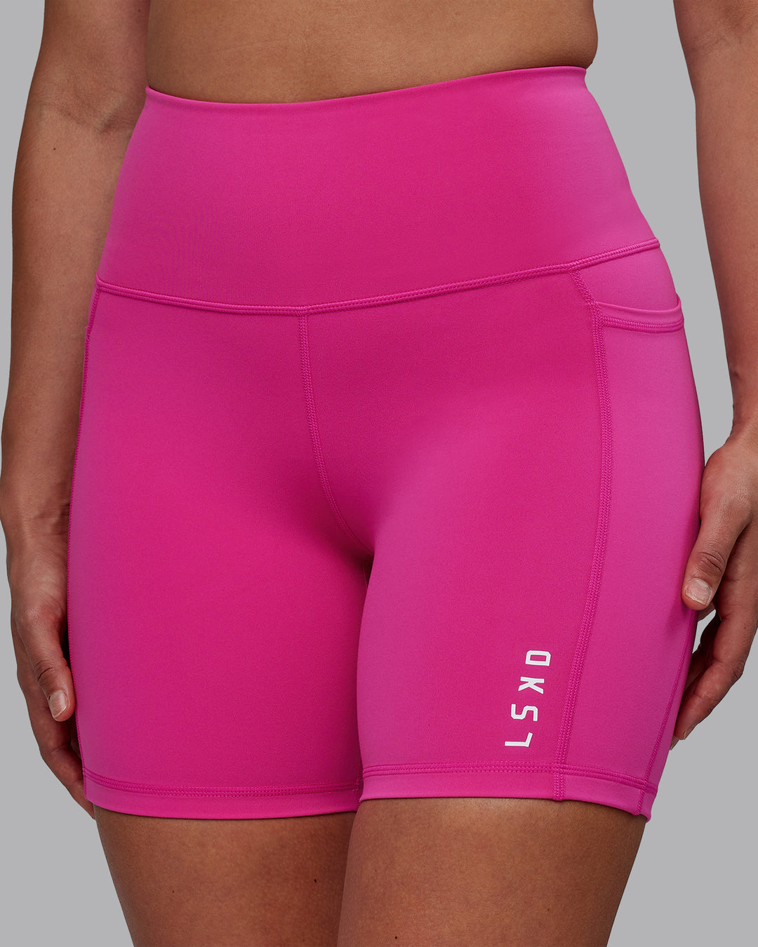 Woman wearing Flux Ultra High-Rise 6" Short Pockets - Fuchsia Pink - view 6