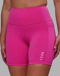 Woman wearing Flux Ultra High-Rise 6" Short Pockets - Fuchsia Pink | Thumbnail Index: 5