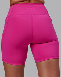 Woman wearing Flux Ultra High-Rise 6" Short Pockets - Fuchsia Pink | Thumbnail Index: 6