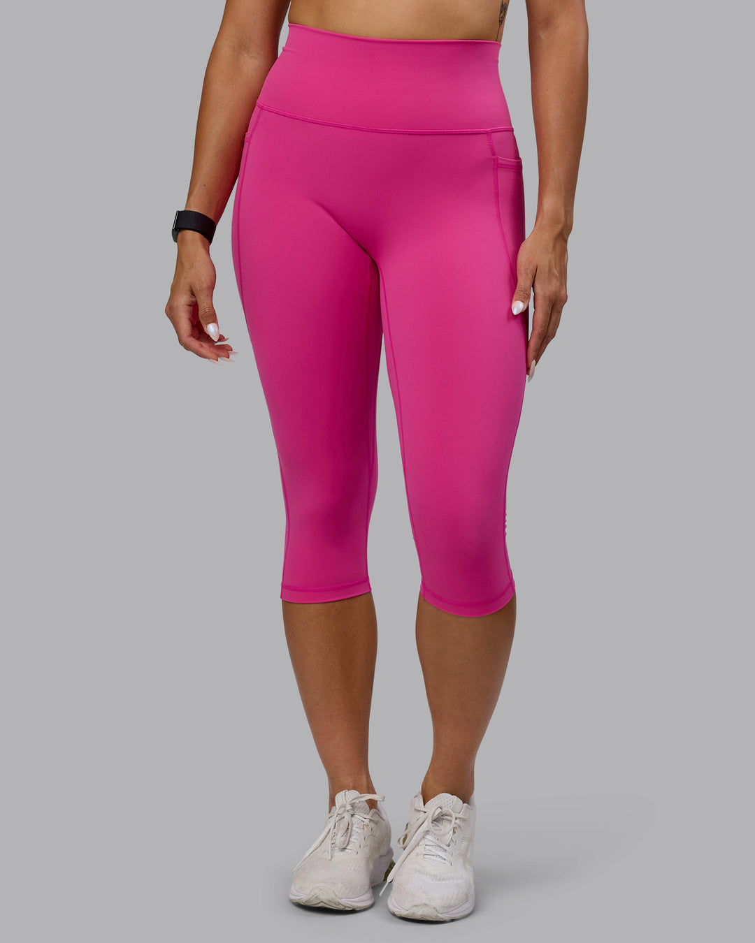 Woman wearing Fusion Ultra High-Rise 3/4 Legging Pockets - Fuchsia Pink | Model:Vanessa | Size:S - view 8