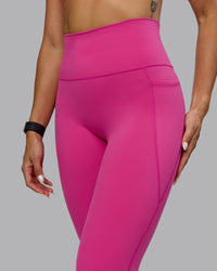 Woman wearing Fusion Ultra High-Rise 3/4 Legging Pockets - Fuchsia Pink | Model:Vanessa | Size:S | Thumbnail Index: 4