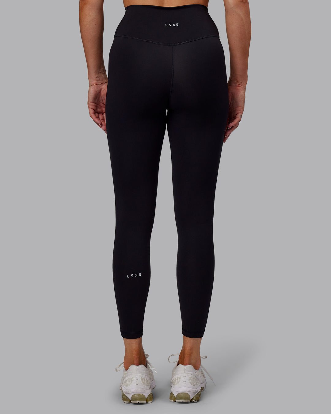 Woman wearing Fusion Ultra High-Rise 7/8 Legging - Black | Model:Hannah | Size:S - view 4