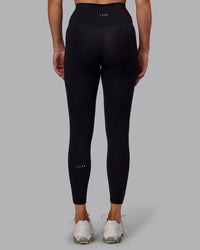 Woman wearing Fusion Ultra High-Rise 7/8 Legging - Black | Model:Hannah | Size:S | Thumbnail Index: 3