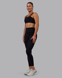 Woman wearing Fusion Ultra High-Rise 7/8 Legging - Black | Model:Hannah | Size:S | Thumbnail Index: 4