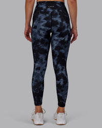 Woman wearing Fusion Ultra High-Rise 7/8 Legging Pockets - Tie Dye-Midnight | Model:Halle | Size:S | Thumbnail Index: 2