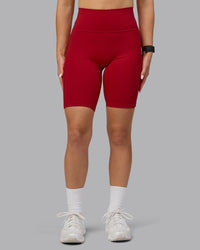 Woman wearing Fusion Ultra High-Rise 9" Short Pockets - Cherry Red | Model:Halle | Size:S | Thumbnail Index: 7