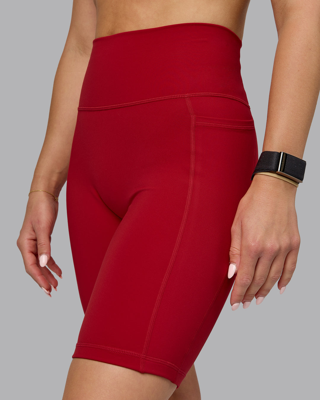 Woman wearing Fusion Ultra High-Rise 9" Short Pockets - Cherry Red | Model:Halle | Size:S - view 6