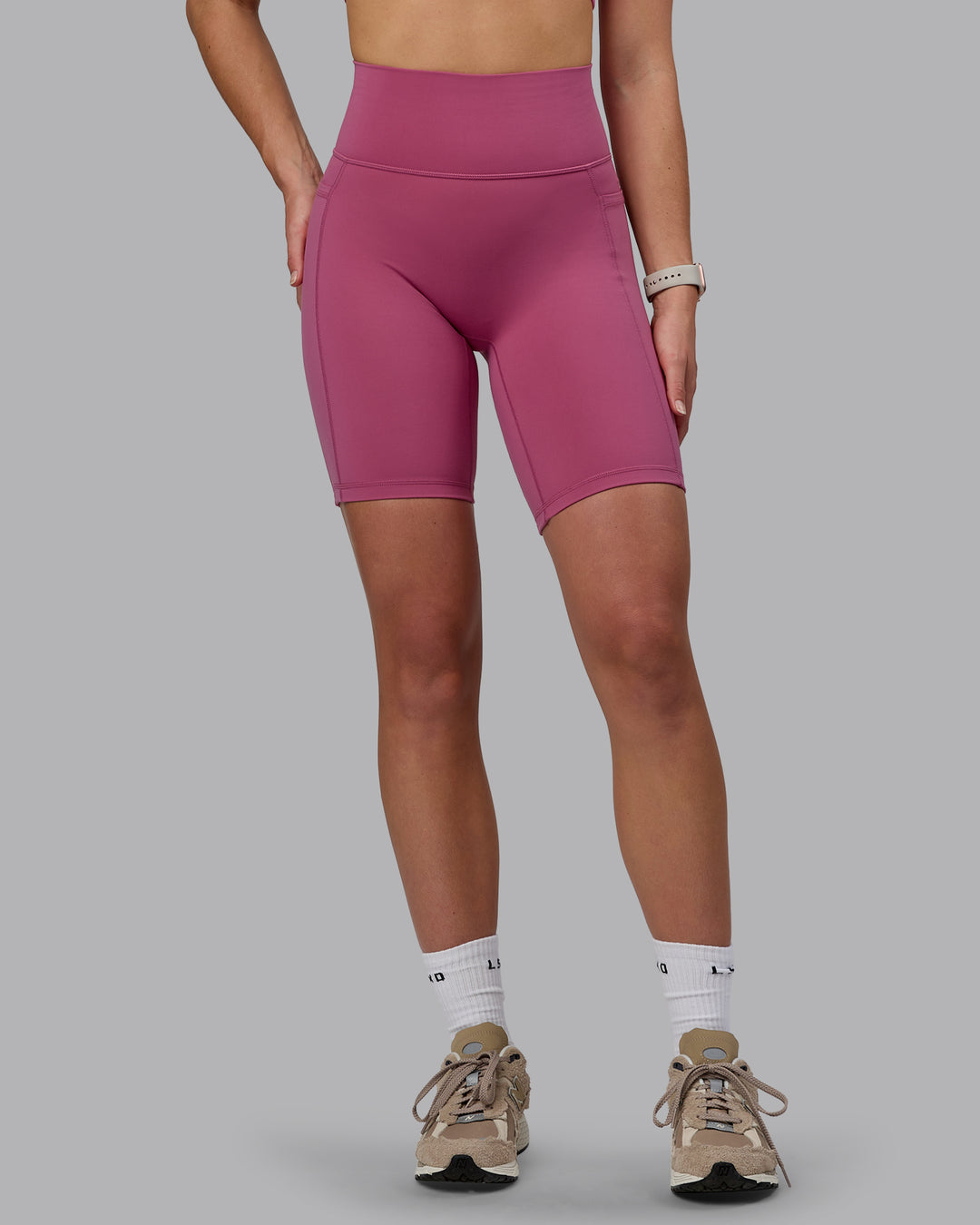 Woman wearing Fusion Ultra High-Rise 9" Short Pockets - Mauve Haze | Model:Chloe | Size:XS - view 8