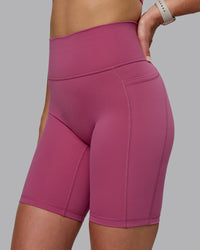 Woman wearing Fusion Ultra High-Rise 9" Short Pockets - Mauve Haze | Model:Chloe | Size:XS | Thumbnail Index: 1