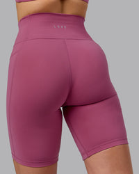 Woman wearing Fusion Ultra High-Rise 9" Short Pockets - Mauve Haze | Model:Chloe | Size:XS | Thumbnail Index: 6