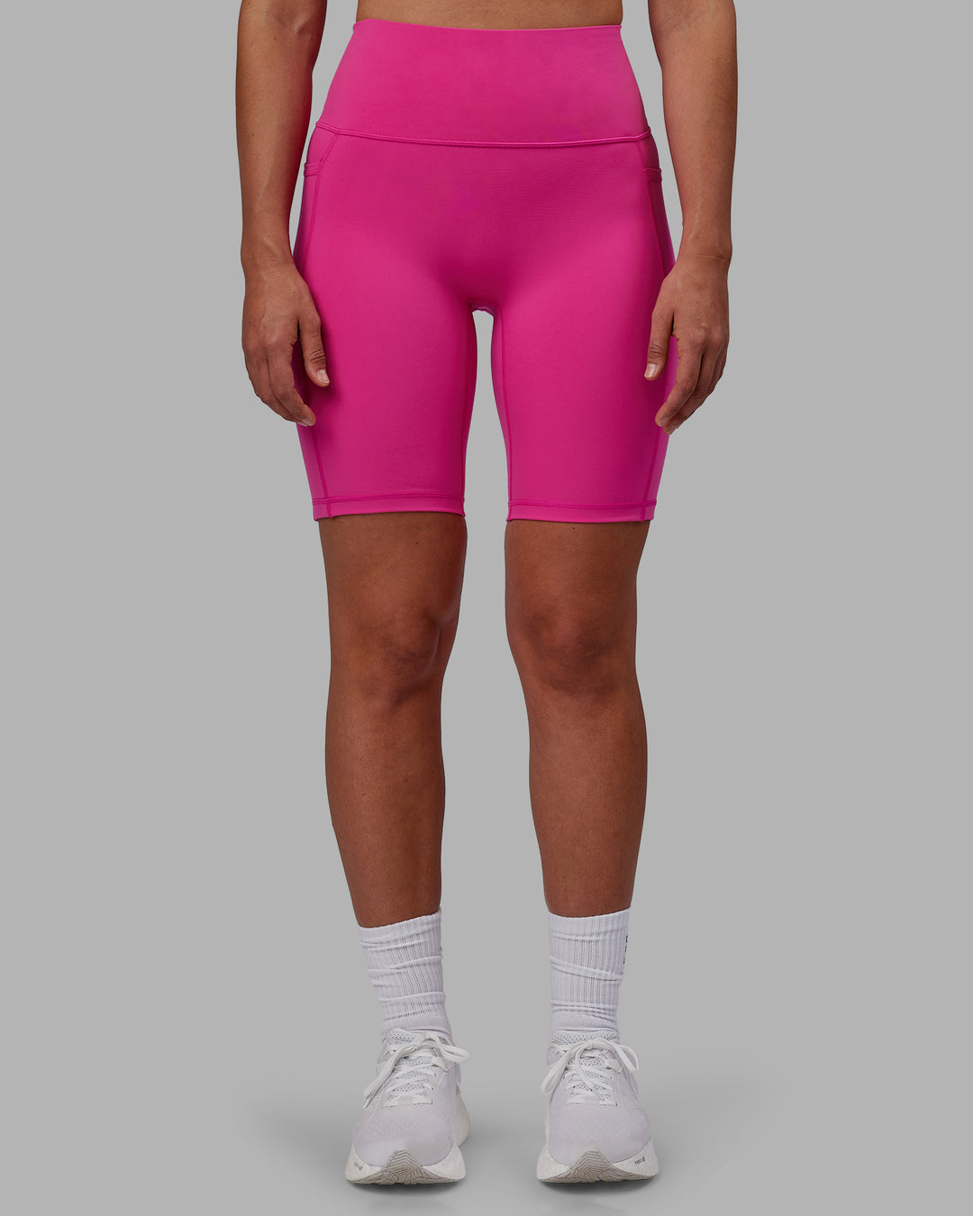 Woman wearing Fusion Ultra High-Rise 9" Short Pockets - Fuchsia Pink | Model:Sophie | Size:S - view 9