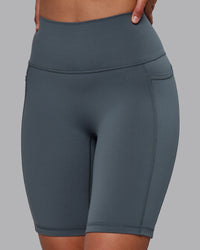 Woman wearing Fusion Ultra High-Rise 9" Short Pockets - Turbulence | Model:Sophie | Size:S | Thumbnail Index: 5