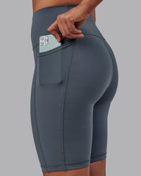 Woman wearing Fusion Ultra High-Rise 9" Short Pockets - Turbulence | Model:Sophie | Size:S | Thumbnail Index: 3