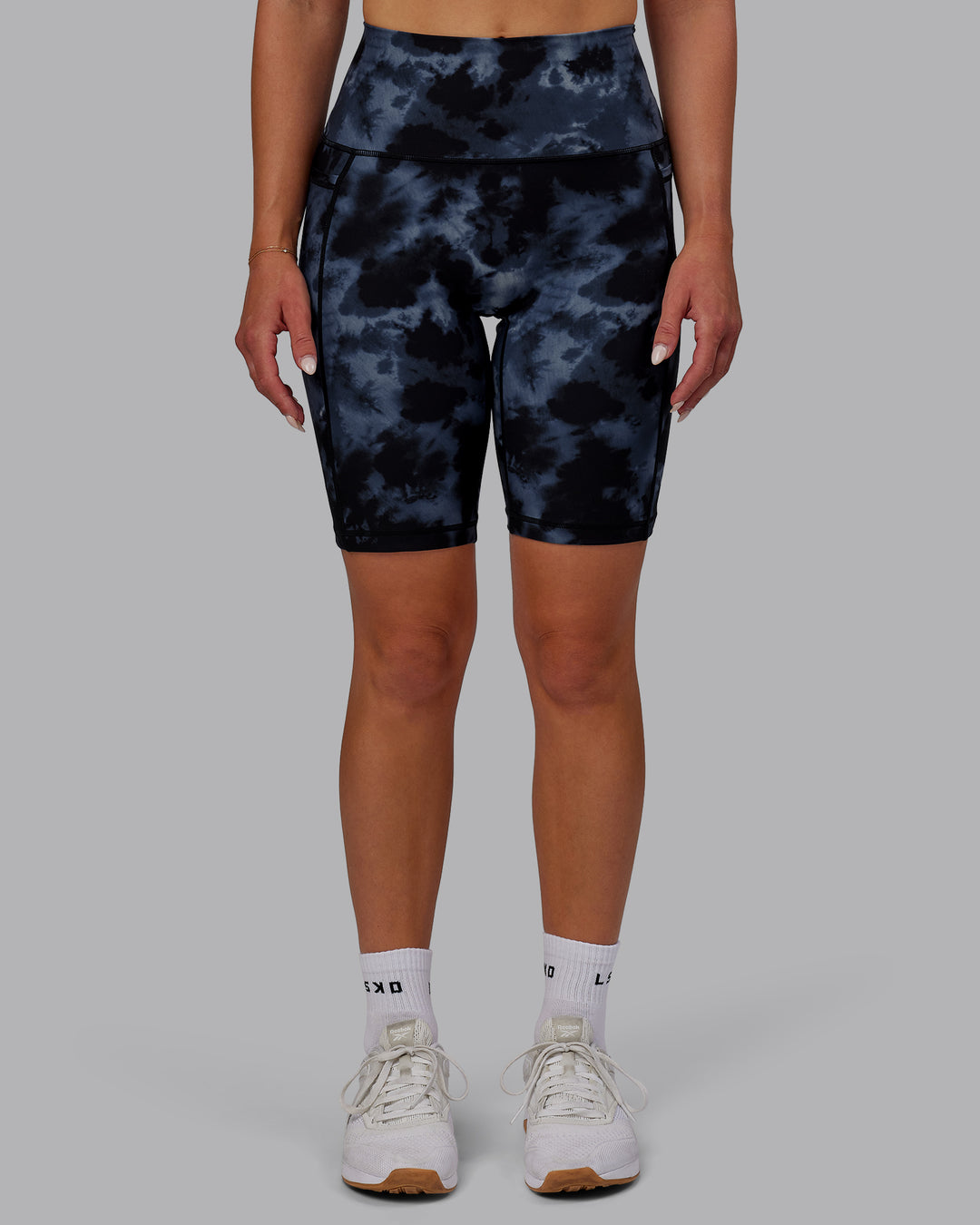 Woman wearing Fusion Ultra High-Rise 9" Short Pockets - Tie Dye-Midnight | Model:Halle | Size:S - view 9