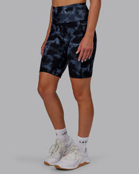 Woman wearing Fusion Ultra High-Rise 9" Short Pockets - Tie Dye-Midnight | Model:Halle | Size:S | Thumbnail Index: 0