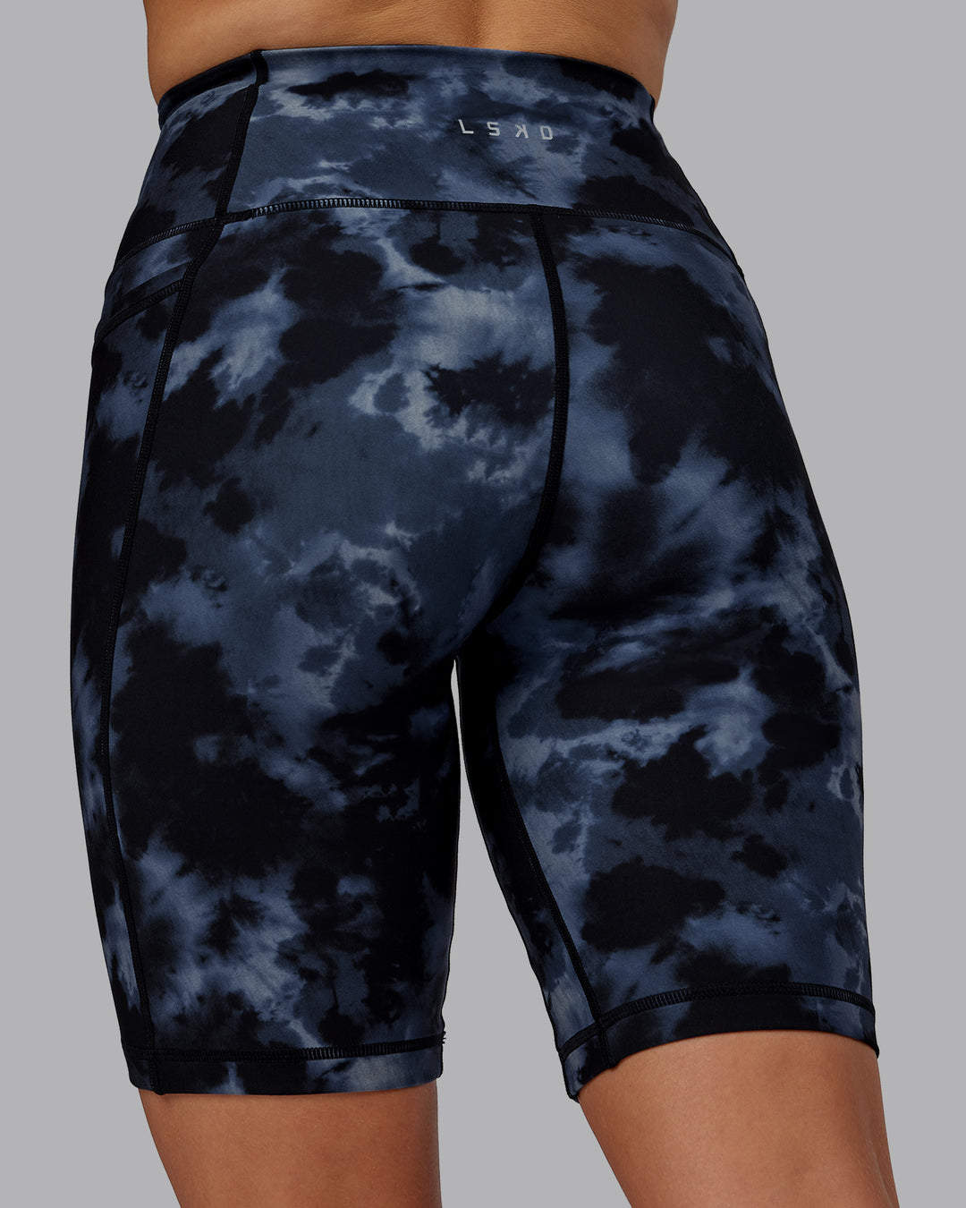 Woman wearing Fusion Ultra High-Rise 9" Short Pockets - Tie Dye-Midnight | Model:Halle | Size:S - view 7