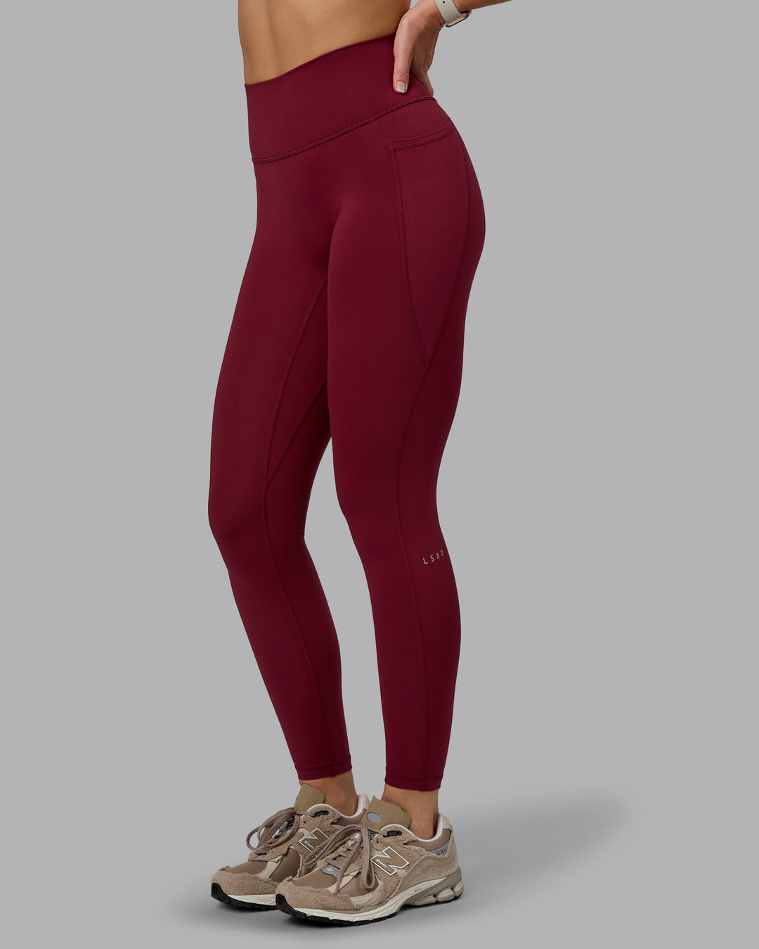 Woman wearing Fusion Ultra High-Rise Full Length Legging Pockets - Cordovan | Model:Chloe | Size:XS - view 6